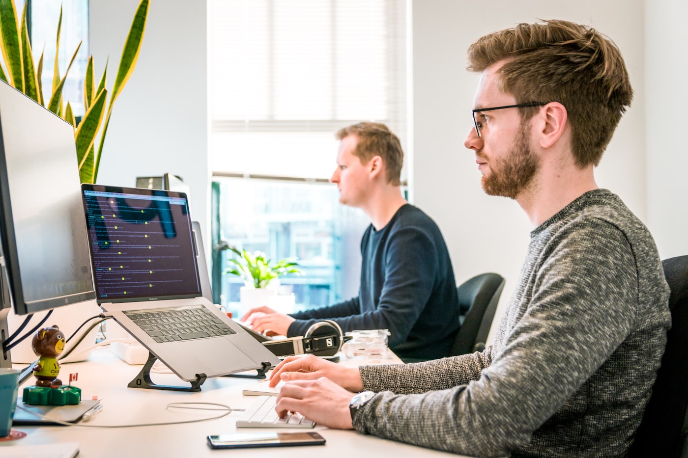 IT team collaborating in a busy technology environment